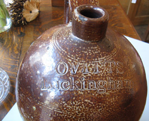 A flagon stamped Ovitts, Buckingham