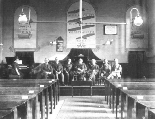 Interior of Baptist Tabernacle with leading members seated, 1926