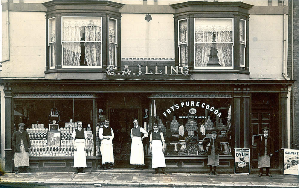 Staff standing in front of shop