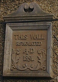 Plaque on renovated wall